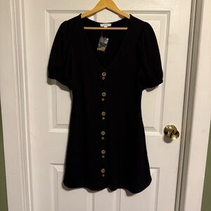 Elegant Black Mini Dress with Button Detail